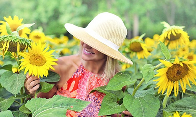 Como ficaria sua Foto com uma Borda de Girassóis?